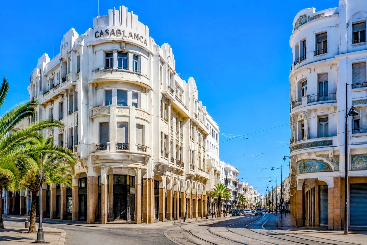 Art Deco architecture in Casablanca city center under a clear blue sky, showcasing Morocco’s unique blend of European and Moroccan design during 6 Day Casablanca to Marrakech Discovery Tour