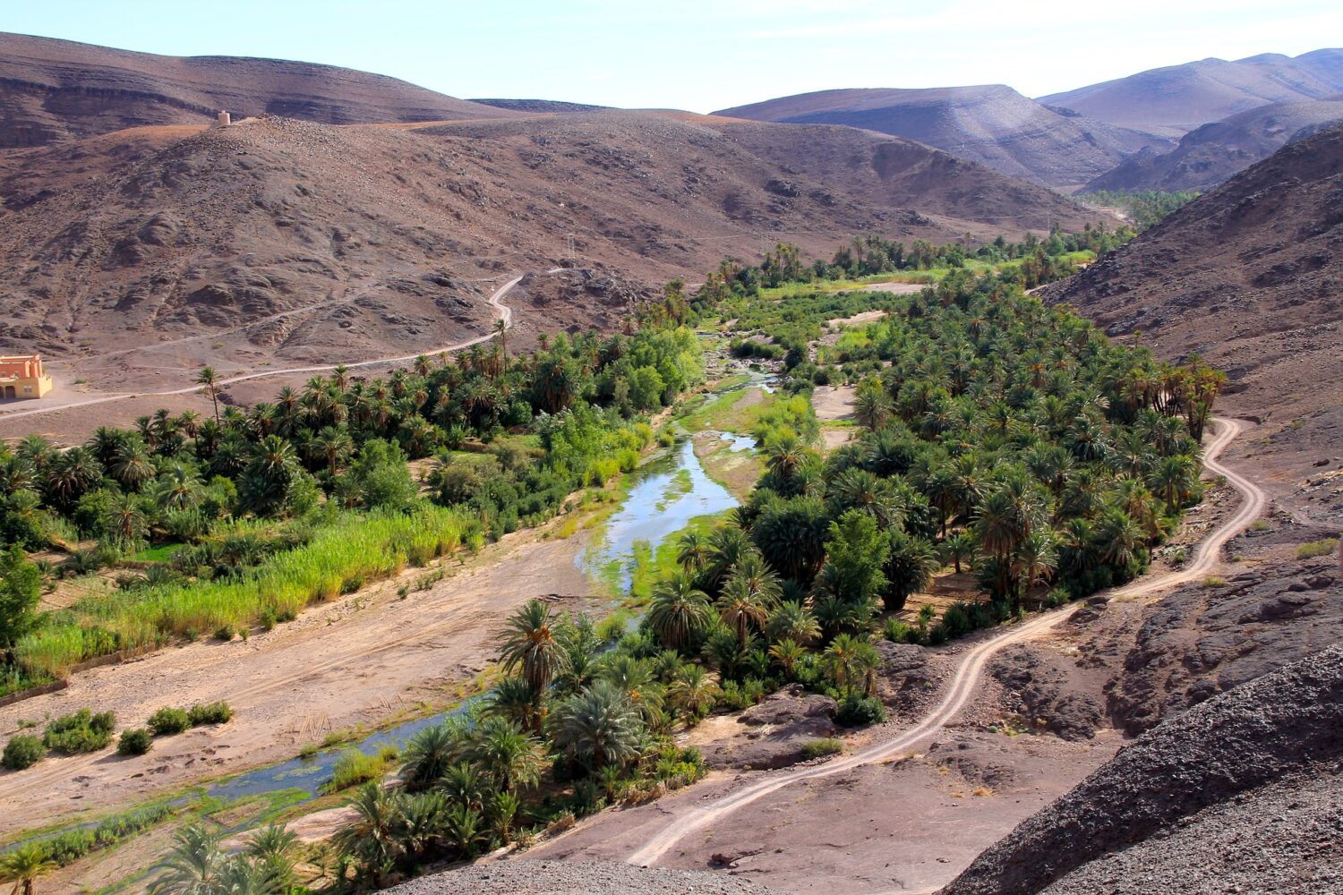 Road through the High Atlas Mountains with valleys and hills in Morocco