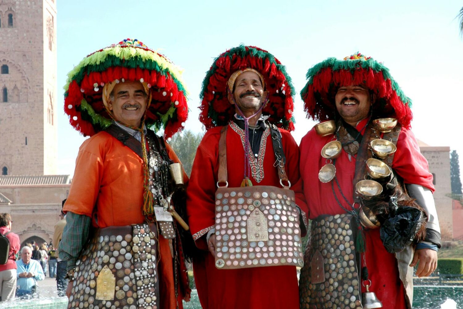 Traditional Moroccan water sellers in Marrakech during a guided city tour