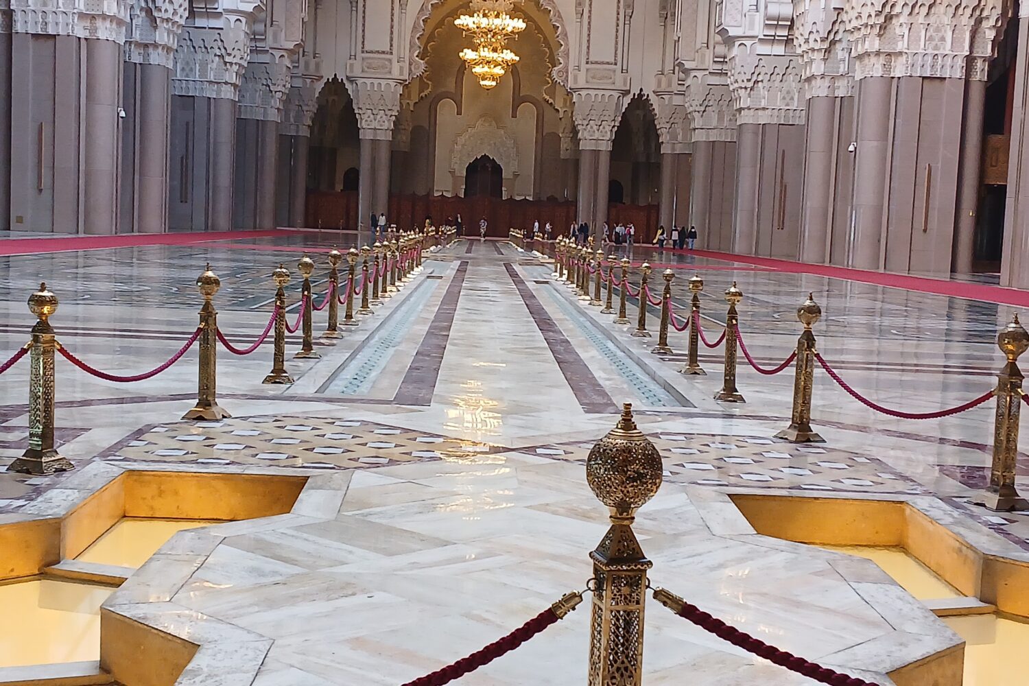 Interior of Hassan II Mosque in Casablanca with marble columns and ornate arches