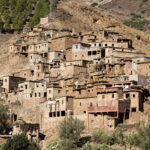 Traditional Berber village in the Atlas Mountains, Morocco – authentic mud-brick houses and mountain scenery