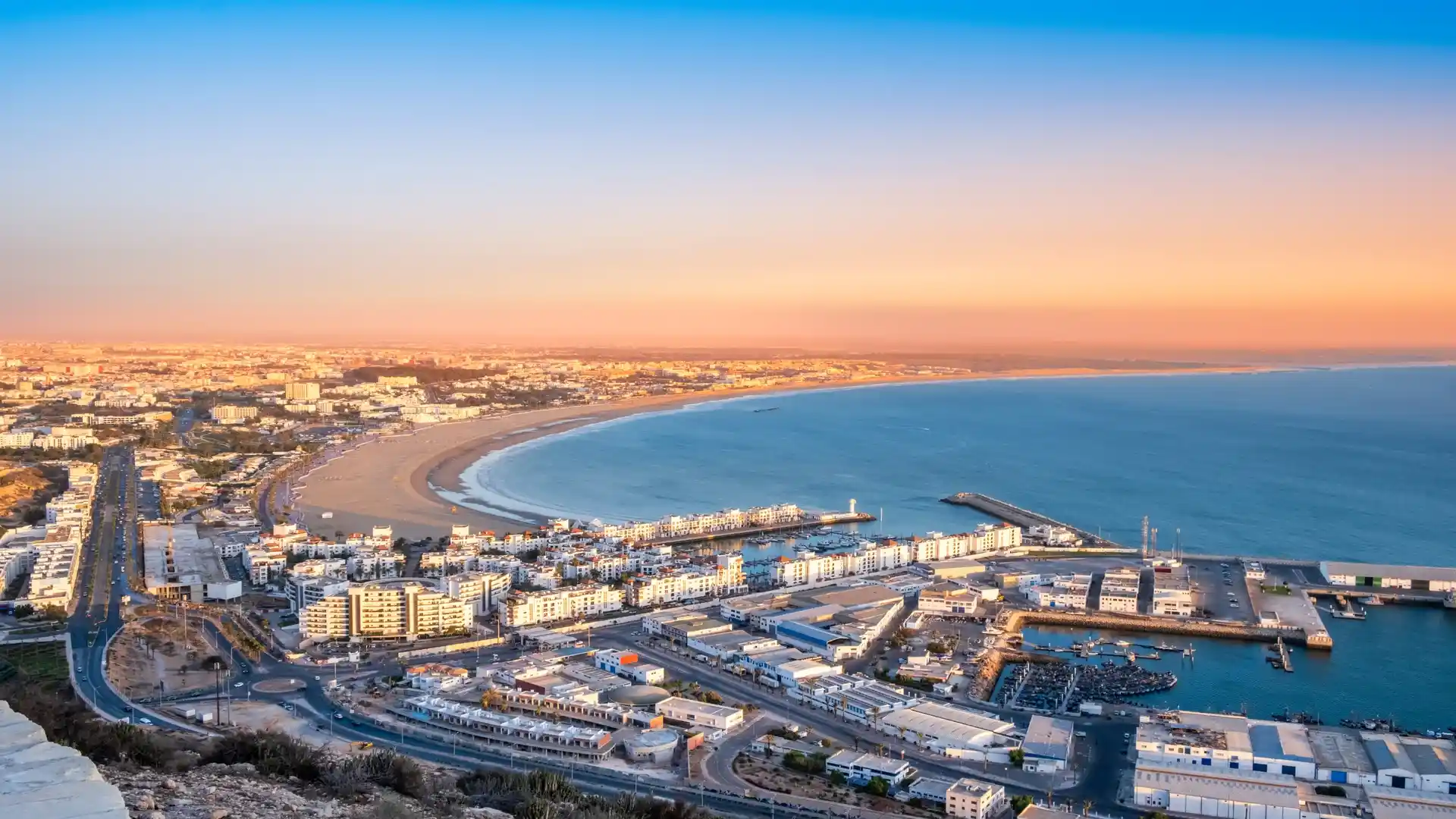 Agadir Morocco coastline at sunset with city and beach view