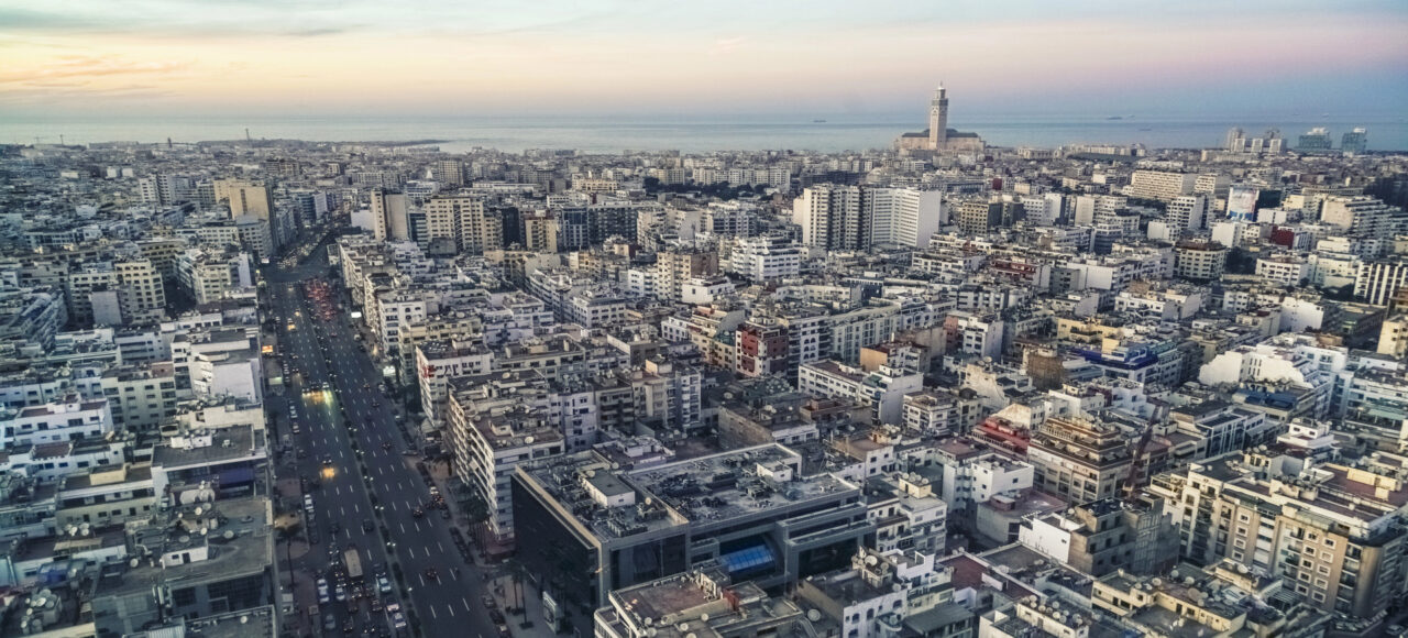 Cityscape by sunset with Casablanca skyline – Private Day Trip from Marrakech to Casablanca