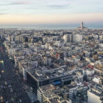 Cityscape by sunset with Casablanca skyline – Private Day Trip from Marrakech to Casablanca
