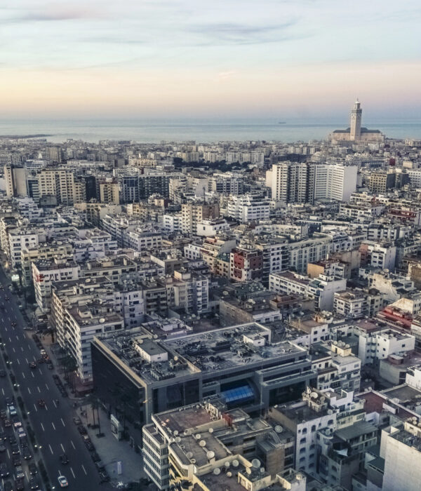 Cityscape by sunset with Casablanca skyline – Private Day Trip from Marrakech to Casablanca