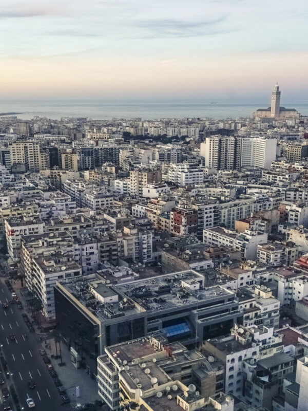 Cityscape by sunset with Casablanca skyline – Private Day Trip from Marrakech to Casablanca