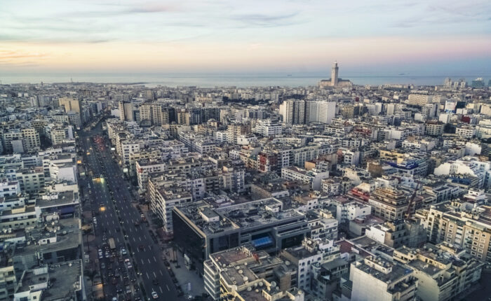 Cityscape by sunset with Casablanca skyline – Private Day Trip from Marrakech to Casablanca