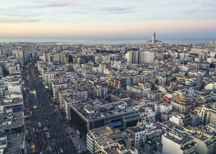 Cityscape by sunset with Casablanca skyline – Private Day Trip from Marrakech to Casablanca
