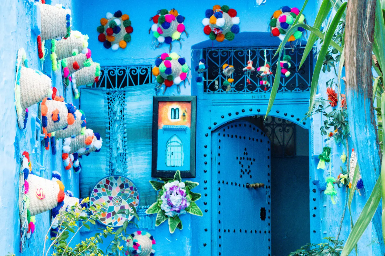 Blue door and decorations in Chefchaouen on 8 days Tangier to Marrakech cultural tour
