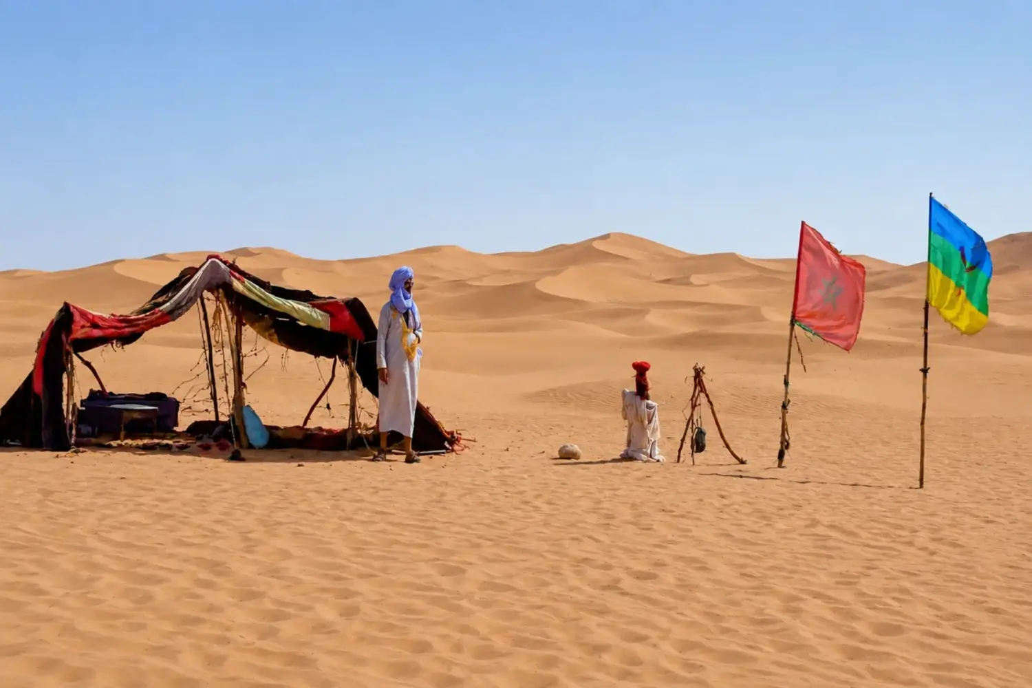 Nomad man in the heart of the Merzouga Desert sand dunes in Morocco with Morocco Marrakech Gems