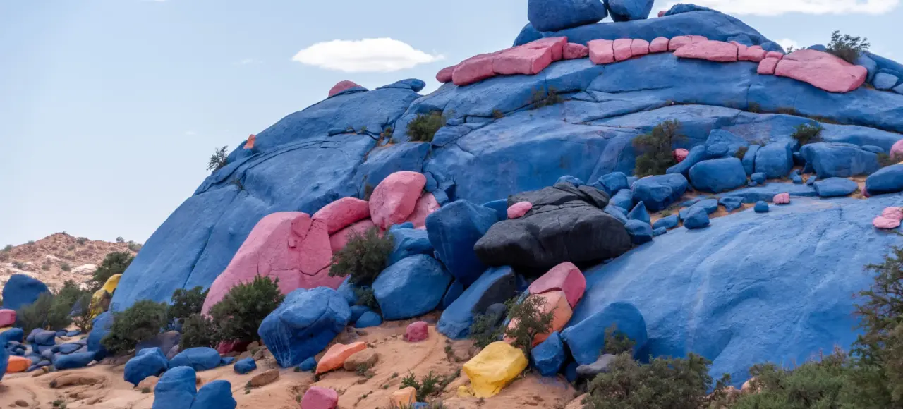 Colorful painted rocks in Tafraout Morocco surrounded by desert landscape