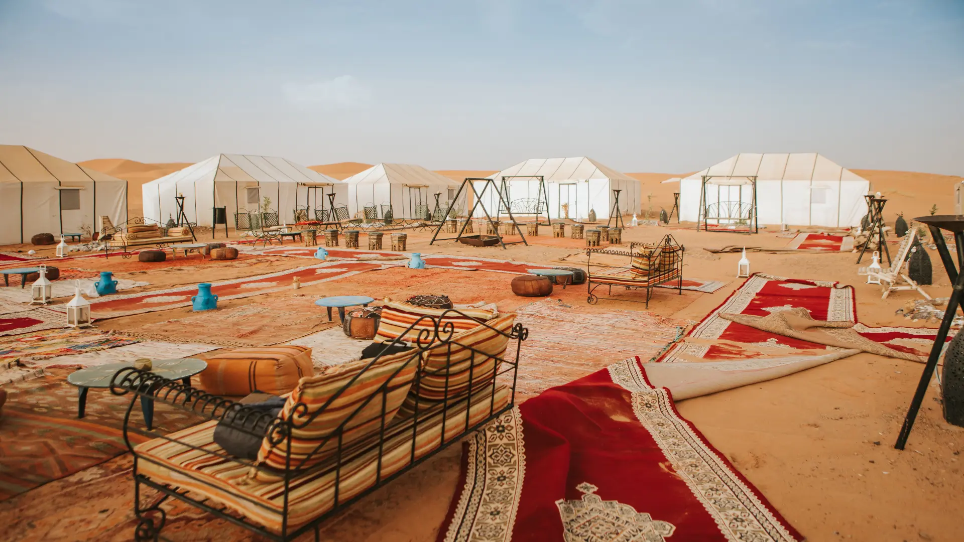 Luxury desert camp in Merzouga Sahara with traditional tents and seating area for how many days do you need in morocco? 2026