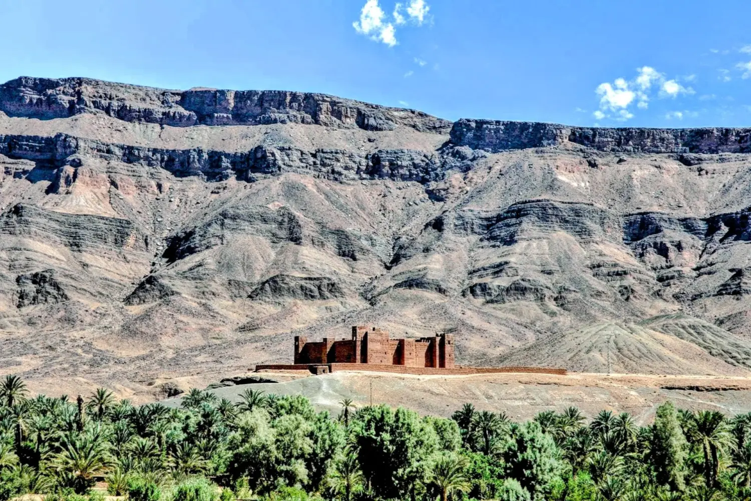 Draa Valley palm groves and traditional kasbah landscape 2 Day To Zagora From Marrakech