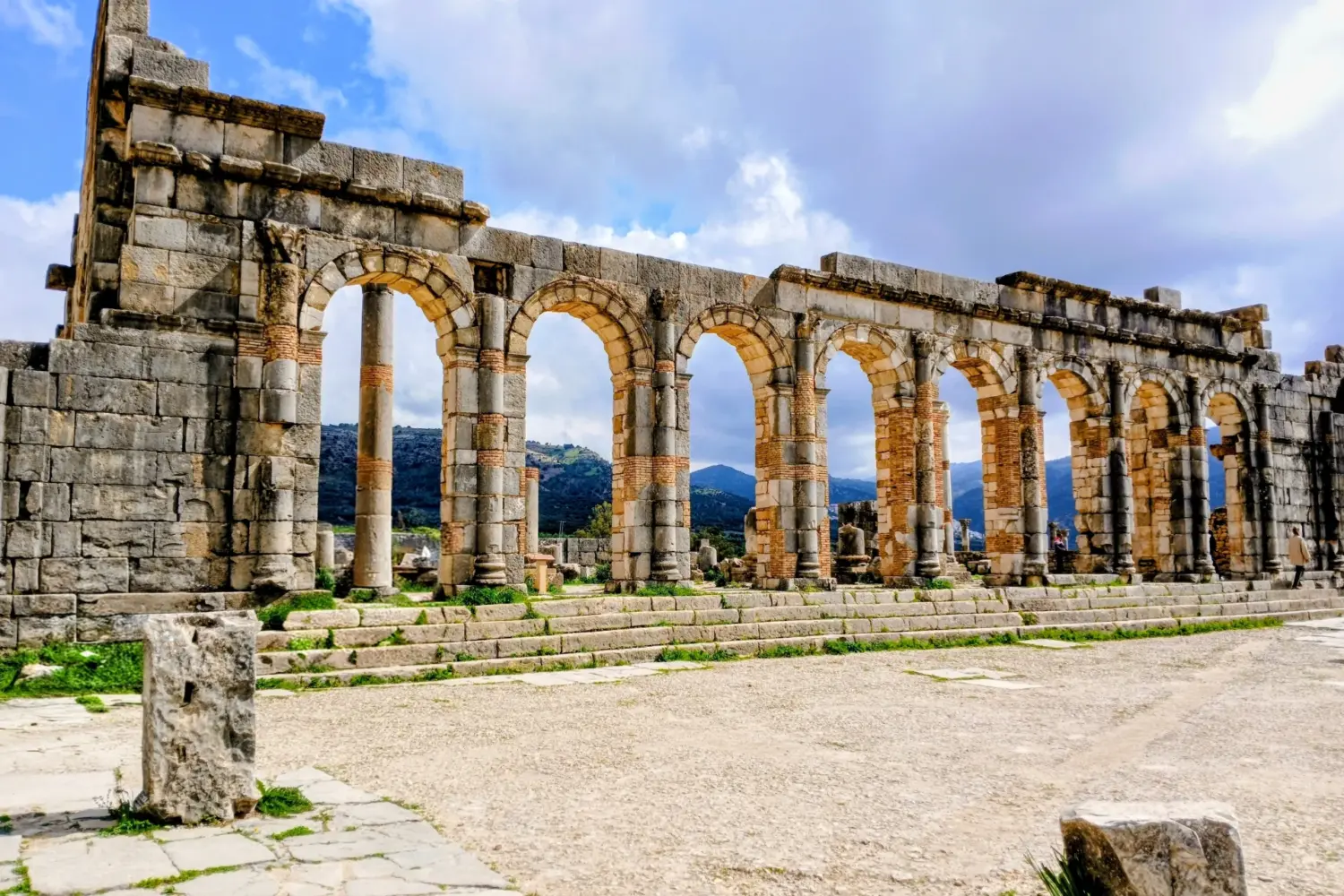 Roman arches in Volubilis ruins Morocco.