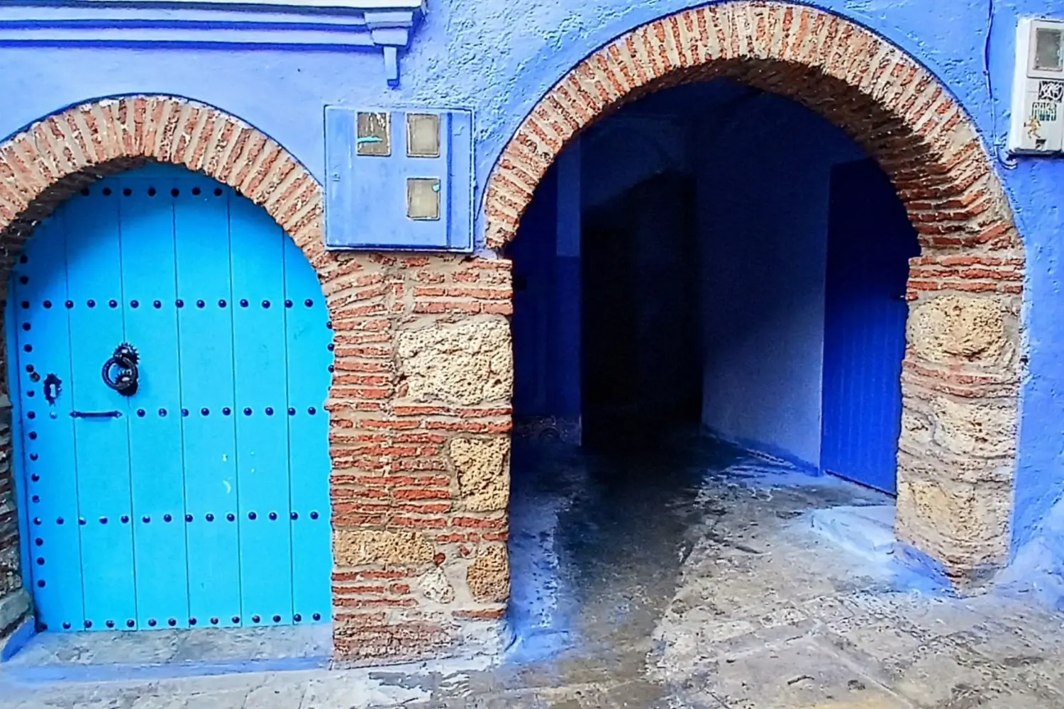 Blue door in Chefchaouen medina during a Day Trip from Fes to Chefchaouen