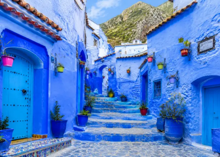 Blue streets and traditional architecture in Chefchaouen during the 30 Day Morocco Explorer Tour from Casablanca.